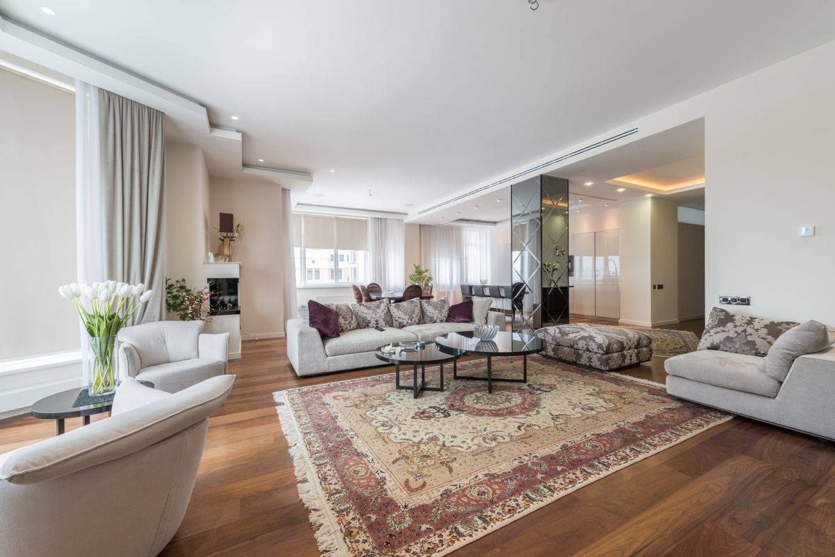 Bright apartment living room with large windows